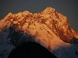 Gokyo Ri 06-2 Nuptse and Lhotse Close Up From Gokyo Ri At Sunset Nuptse and Lhotse change from white to yellow to red in the last rays of the sun from Gokyo Ri.